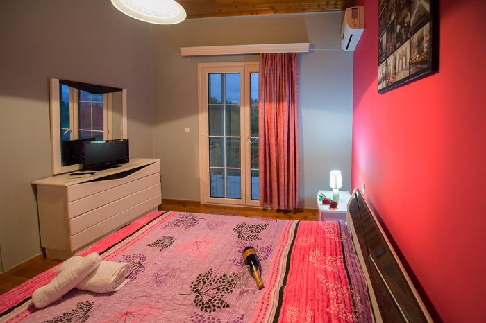 magicians-apartments-lefkada-kaligoni-double-bed-bedroom-view-balcony