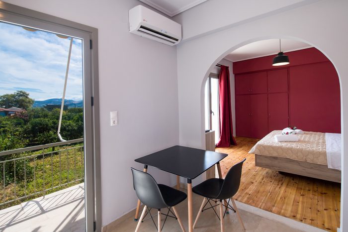 magicians-apartments-lefkada-kaligoni-master-bedroom-lounge-balcony-view